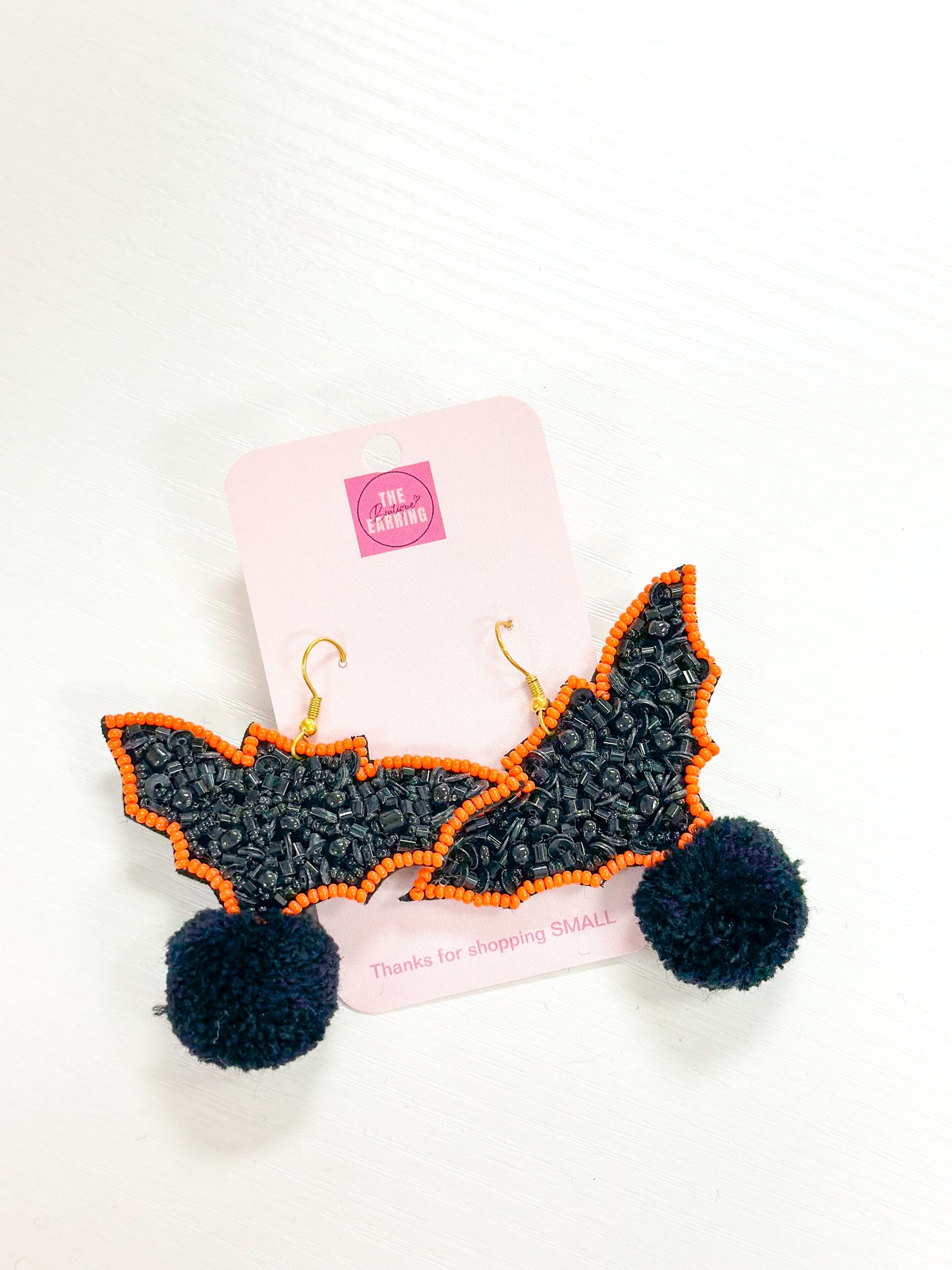 Pom Pom Bat Earring